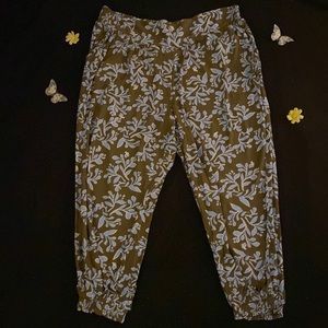 Tan light weight pants with light blue design, bottom leg gathering with pockets